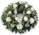 Small wreath with white roses,lilies,orchids for Condolence to Chennai Delivery
